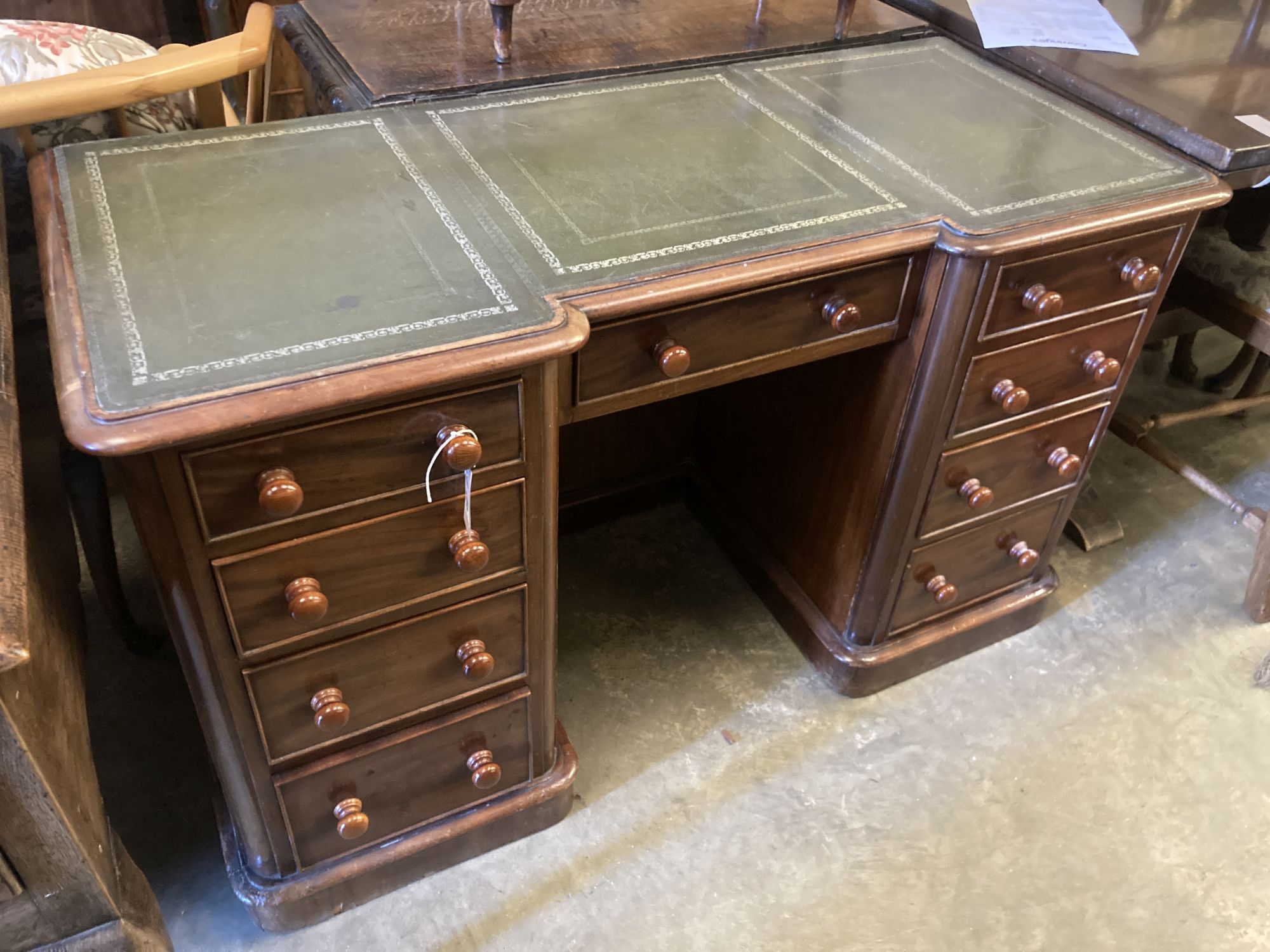 A Victorian mahogany kneehole desk, width 122cm, depth 54cm, height 74cm